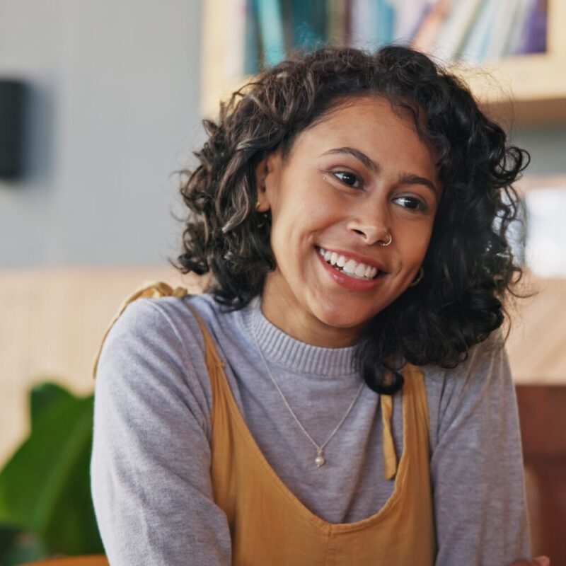 Girl friends, talk and group in cafe, drink and happy for reunion, memory or thinking with smile. G